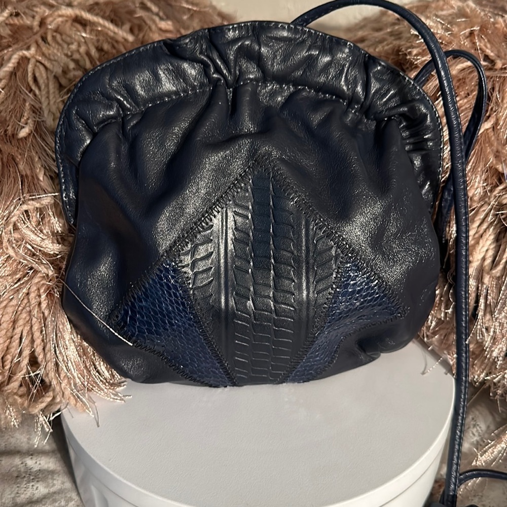 Vintage Leather cross body purse.